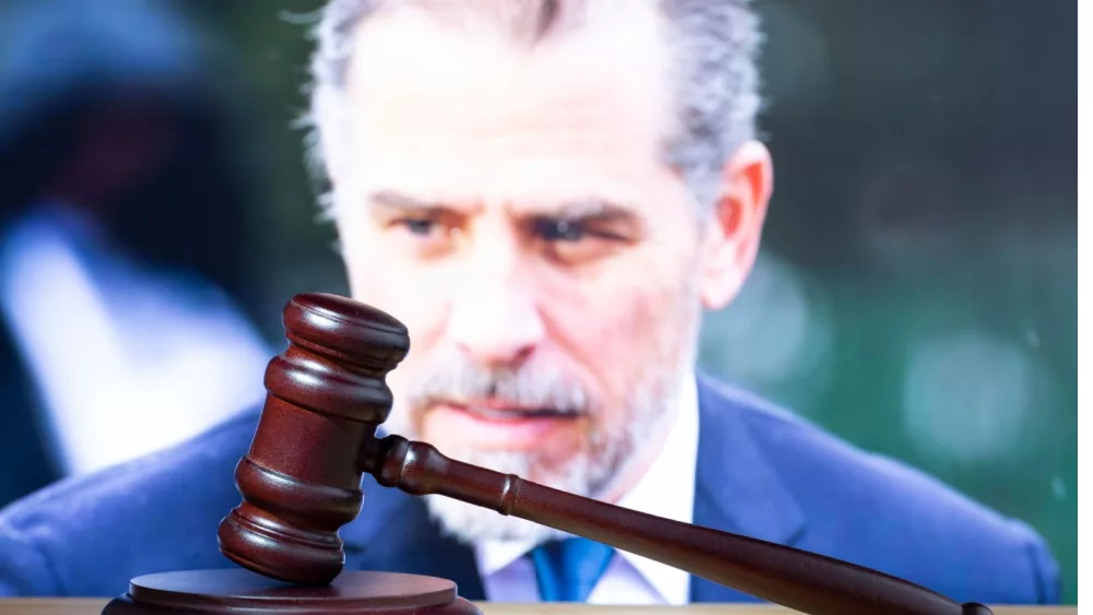 Hunter Biden ^court session. Judicial Hammer on the background of the photo.