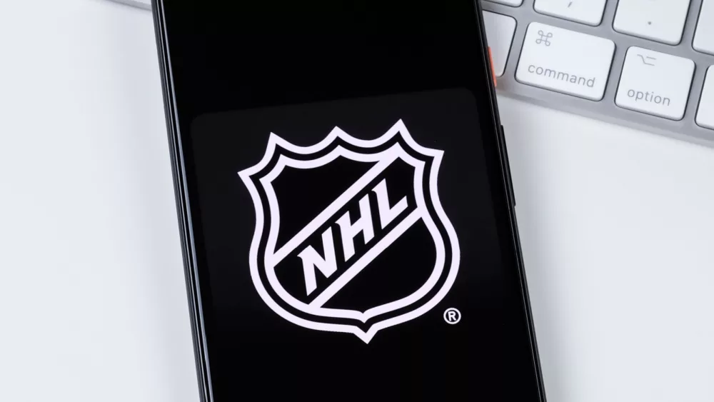 NHL app logo on a smartphone screen.