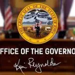 iowa-governor-kim-reynolds-with-signature
