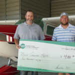 doug-pralle-shine-the-light-garrett-check-presentation