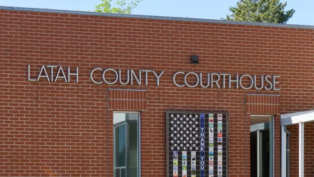 Moscow^ ID^ USA - May 23^ 2023; Text sign for Latah County Courthouse in Moscow Idaho on brick wall