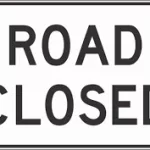 road-closed-sign-with-a-white-background
