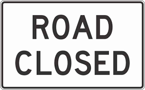 road-closed-sign-with-a-white-background