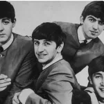 Vintage photo Portrait of The Beatles musical band group. Old textured vintage black and white photograph 1960s-70s