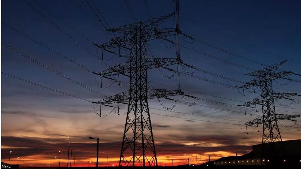 Overhead power lines at sunset in Spain