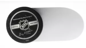 Official game puck from NHL^ National hockey league^ USA. MOTALA^ SWEDEN- 8 FEBRUARY 2022