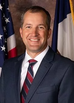 sec-_naig_headshotcropped