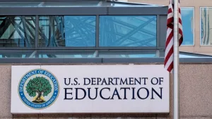 The exterior sign and US flag in front of the U.S. Department of Education offices. Washington^ DC USA; September 5^ 2024: