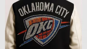OKLAHOMA CITY THUNDER IN ALL RHINESTONES AS PATCH ON BACK OF MENS VARSITY JACKET