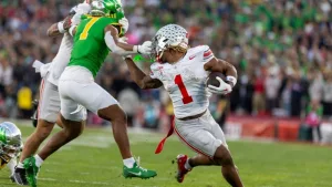 Ohio State running back Quinshon Judkins #1 escapes a tackle-attempt during the 2025 Rose Bowl game on Jan. 1^ 2024^ in Pasadena^ Calif.