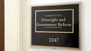 A sign at the entrance to a House Oversight Committee hearing room in Washington^ DC on July 18^ 2017. The House of Representatives is the lower chamber of the US Congress.