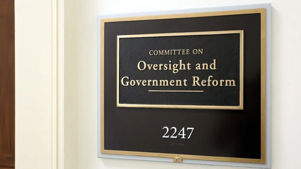 A sign at the entrance to a House Oversight Committee hearing room in Washington^ DC on July 18^ 2017. The House of Representatives is the lower chamber of the US Congress.
