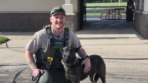 Franklin County Deputy Sheriff Chase Weinandy poses with K9 Skye at National Night Out in Hampton 8/5/2025
