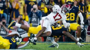 Alabama wide receiver Isaiah Bond (R)is tackled during the 2024 Rose Bowl game Monday^ Jan. 1^ 2024^ in Pasadena^ Calif.