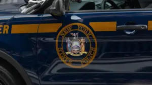 New York State Police Car. Emblem on Door of Trooper Car Manhattan^ New York^USA - November 11. 2019
