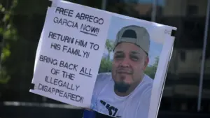 People marching on International Workers' Day in support of workers' rights and against the Trump agenda in Lower Manhattan.NEW YORK^ NEW YORK USA - May 1^ 2025