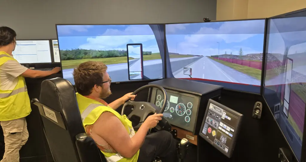 The addition of a second simulation lab allows more students to get practice behind the wheel in a risk-free setting. Simulators allow students to grasp understanding of controls, gauges, and vehicle systems before getting behind the wheel of a real bus or truck. (Photo courtesy Hawkeye Community College)