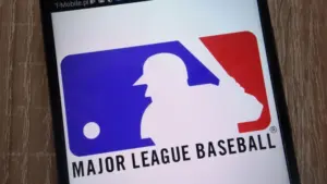 Major League Baseball logo displayed on a modern smartphone KONSKIE^ POLAND - SEPTEMBER 07^ 2018