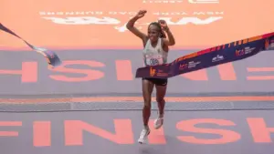 Hellen Obiri of Kenya crossing finish line with time 2:27:23 as a winner of TCS New York City marathon in open women's division in Central Park in New York on November 5^ 2023