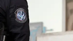 U.S. Customs and Border Protection (CBP) field officers guard a federal building during ICE deportation protests in Downtown LA. Los Angeles^ California^ USA - June 10^ 2025
