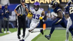 Minnesota Vikings running back Aaron Jones in runs against the Los Angeles Chargers during an NFL football game Oct. 23^ 2025^ in Inglewood^ Calif.