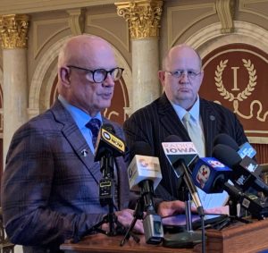 Republican Representative Steve Holt of Denison (on left) speaks during a statehouse news conference. (RI file photo)