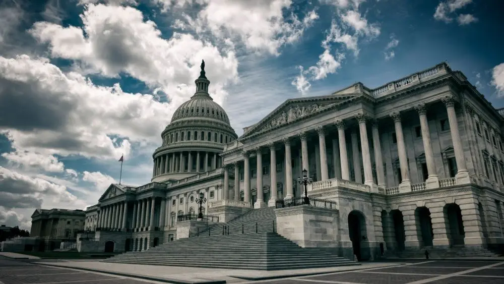 Dark and gloomy view of the deserted US Capitol Building under moody sky in Washington DC^ USA