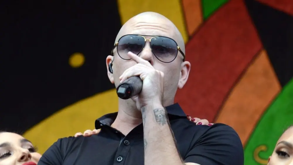 Armando Christian Pérez^ known professionally as Pitbull^ performs onstage at the 2015 New Orleans Jazz and Heritage Festival. New Orleans^ Louisiana - April 26^ 2015