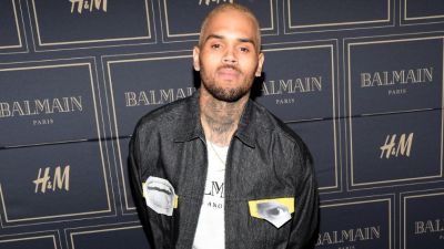 110615-design-before-and-after-images-flipcard-chris-brown-at-the-h-m-x-balmain-release