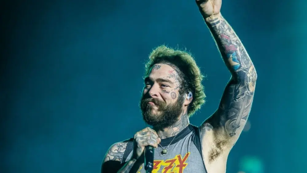 Post Malone delays stadium tour with Jelly Roll to finish upcoming new album