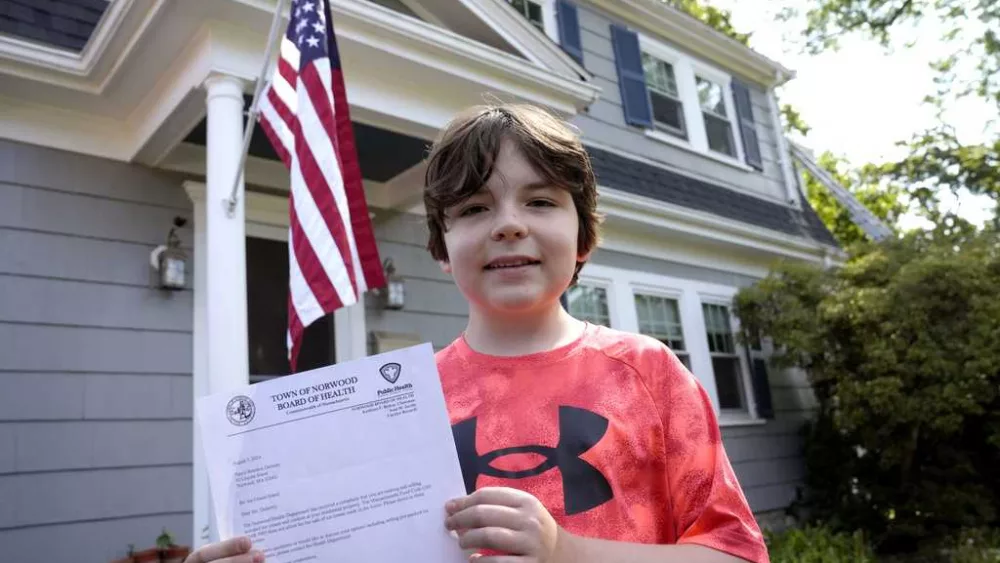 Residents in Boston suburb raised $20K after town officials shut down boy's ice cream stand