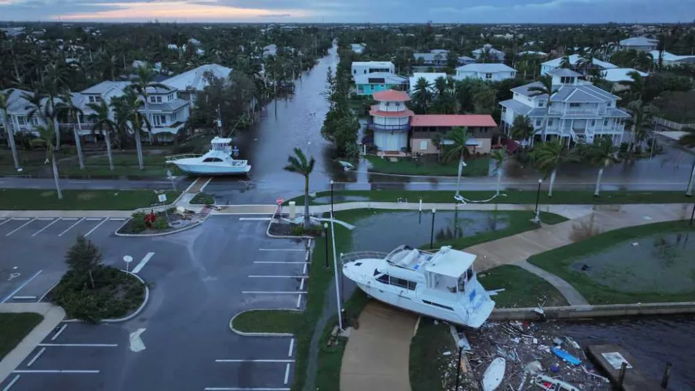 Photos: Hurricane Milton rips off roofs, overturns cars, sparks tornadoes in Florida