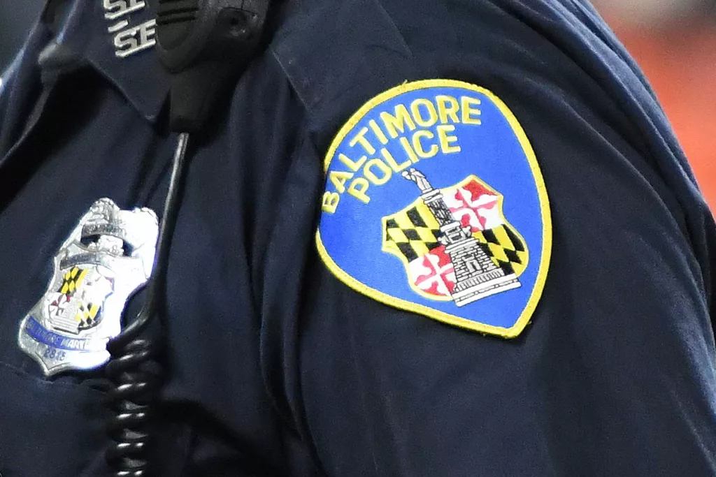 Baltimore police searching for suspect in connection with viral video of assault on football fans