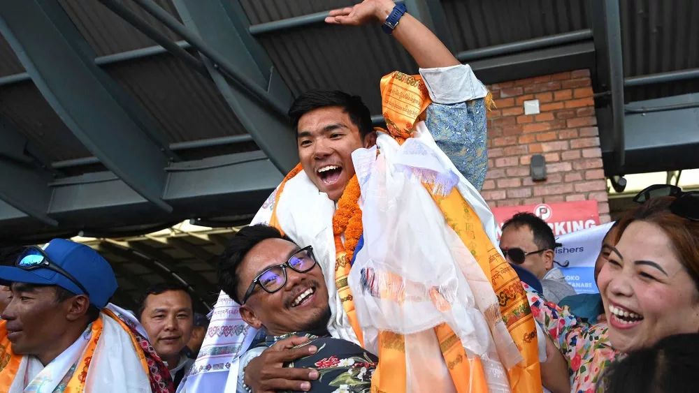 Teen becomes youngest person to summit the world’s highest peaks