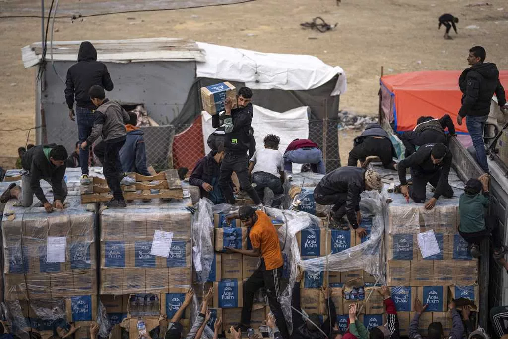 Israel passes two laws to restrict work of UN agency that is a lifeline for Gaza