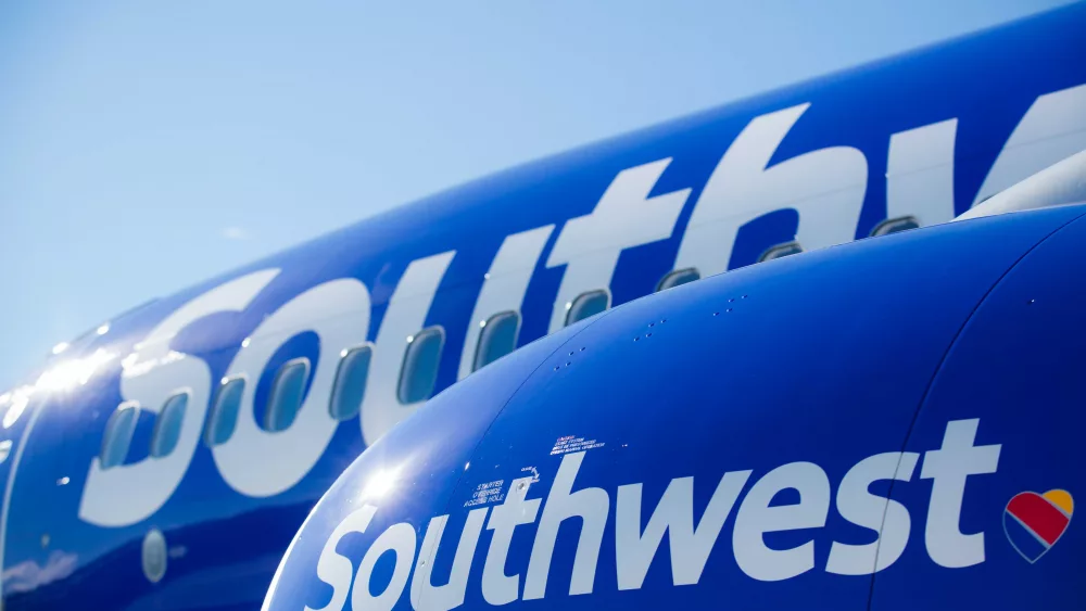 Passengers on parked Southwest plane forced to evacuate after cell phone, airplane seat catch fire