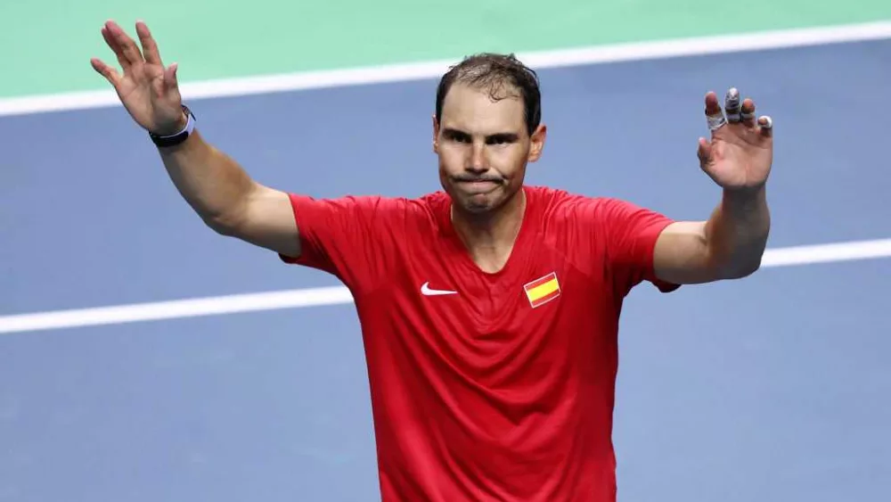 An emotional Rafael Nadal retires at the Davis Cup after he loses and Spain is eliminated