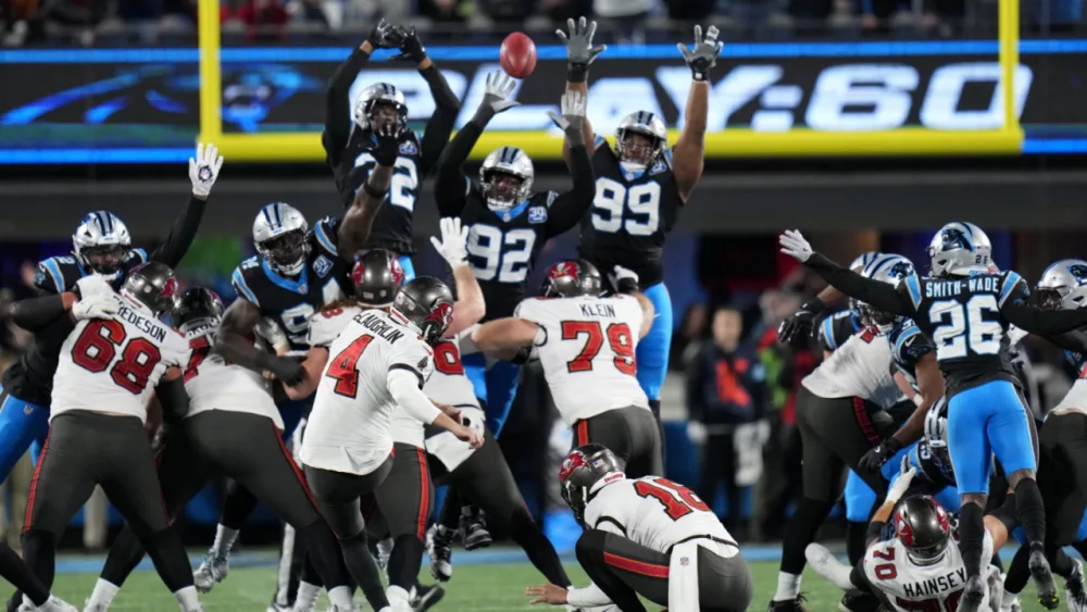 McLaughlin’s field goal in OT helps Bucs beat Panthers 26-23, move into 1st-place tie in NFC South