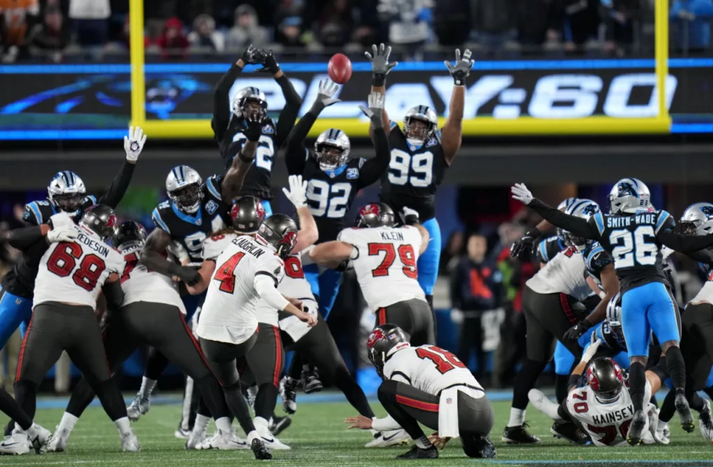 McLaughlin’s field goal in OT helps Bucs beat Panthers 26-23, move into 1st-place tie in NFC South