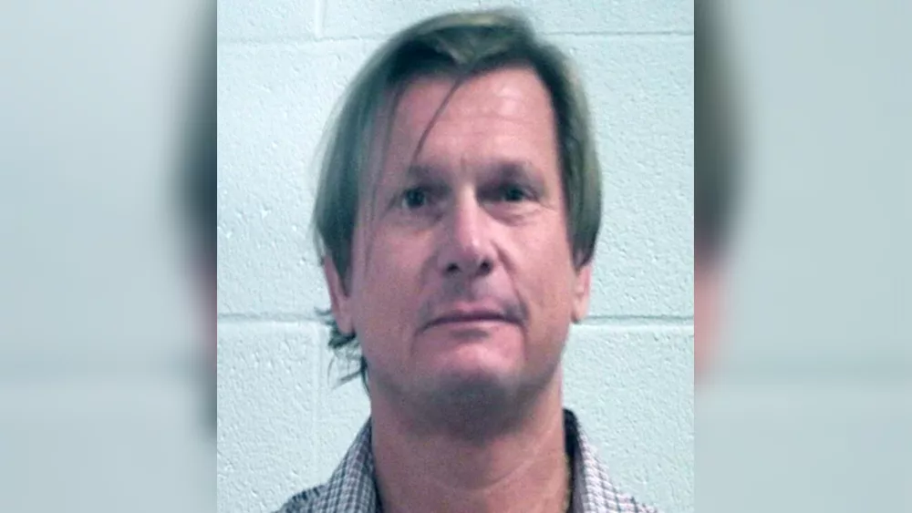 Georgia mayor acquitted of leaving liquor for inmate crew, reinstated to office