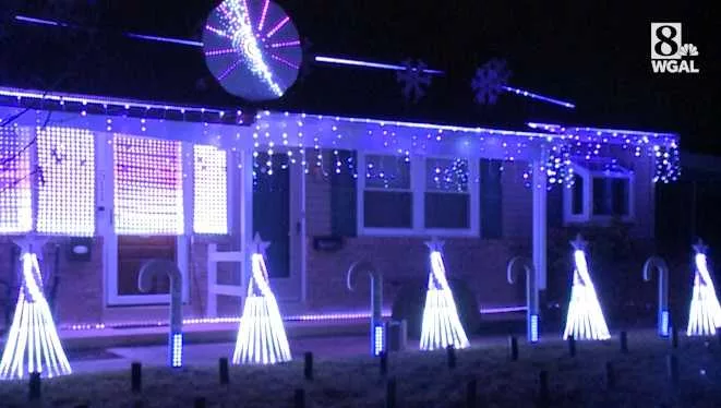 Family uses Christmas display to raise money for organization that helped during cancer battle