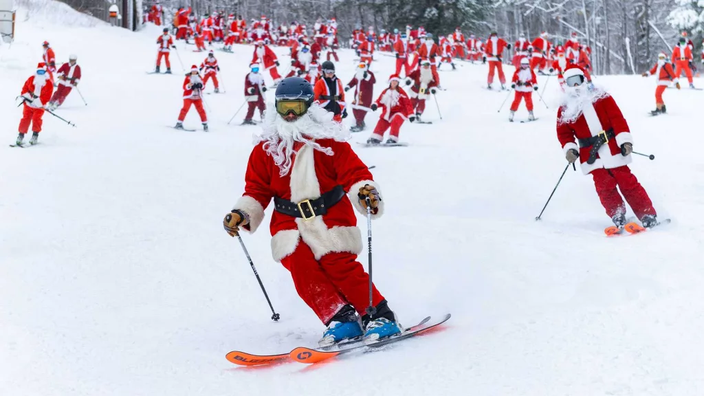 More than 300 Santas hit slopes for good cause