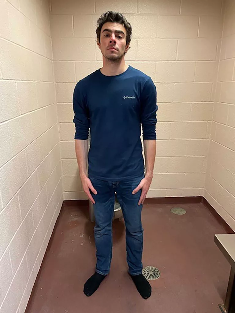 Friends of suspect in fatal CEO shooting left in shock