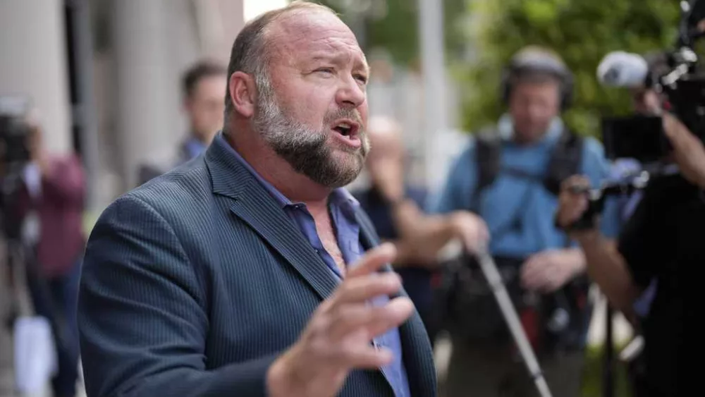 Auctioneer defends The Onion's bid for Infowars as Alex Jones tries stopping sale
