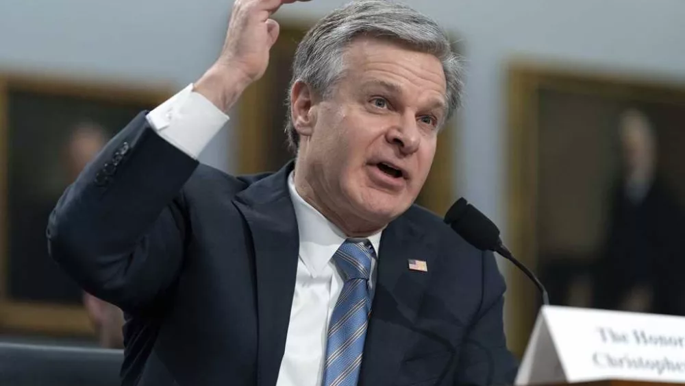 FBI Director Christopher Wray says he intends to resign at the end of President Biden's term