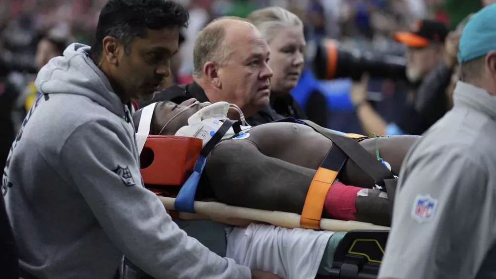 Miami receiver DuBose taken off field on stretcher after hit to the head against Texans