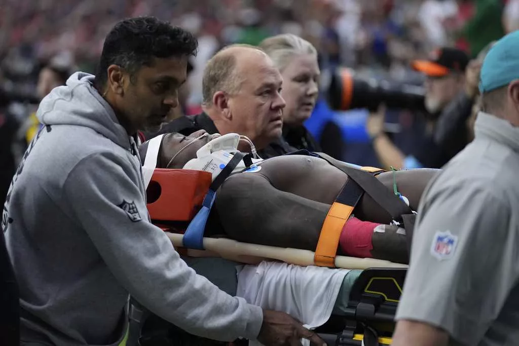 Miami receiver DuBose taken off field on stretcher after hit to the head against Texans