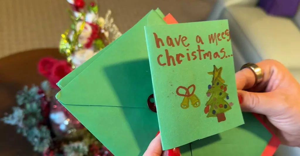 Students make Christmas cards for residents at senior living community