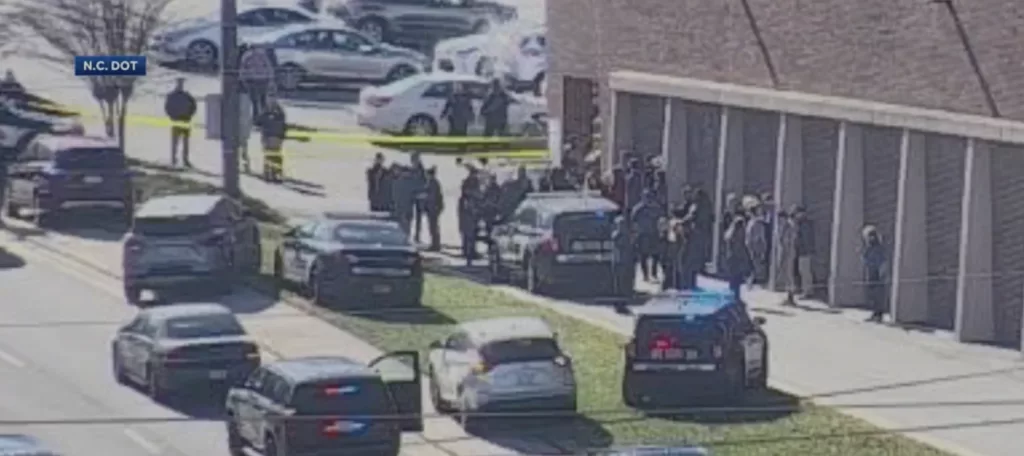 Police officer fatally shot in North Carolina supermarket, suspect in custody