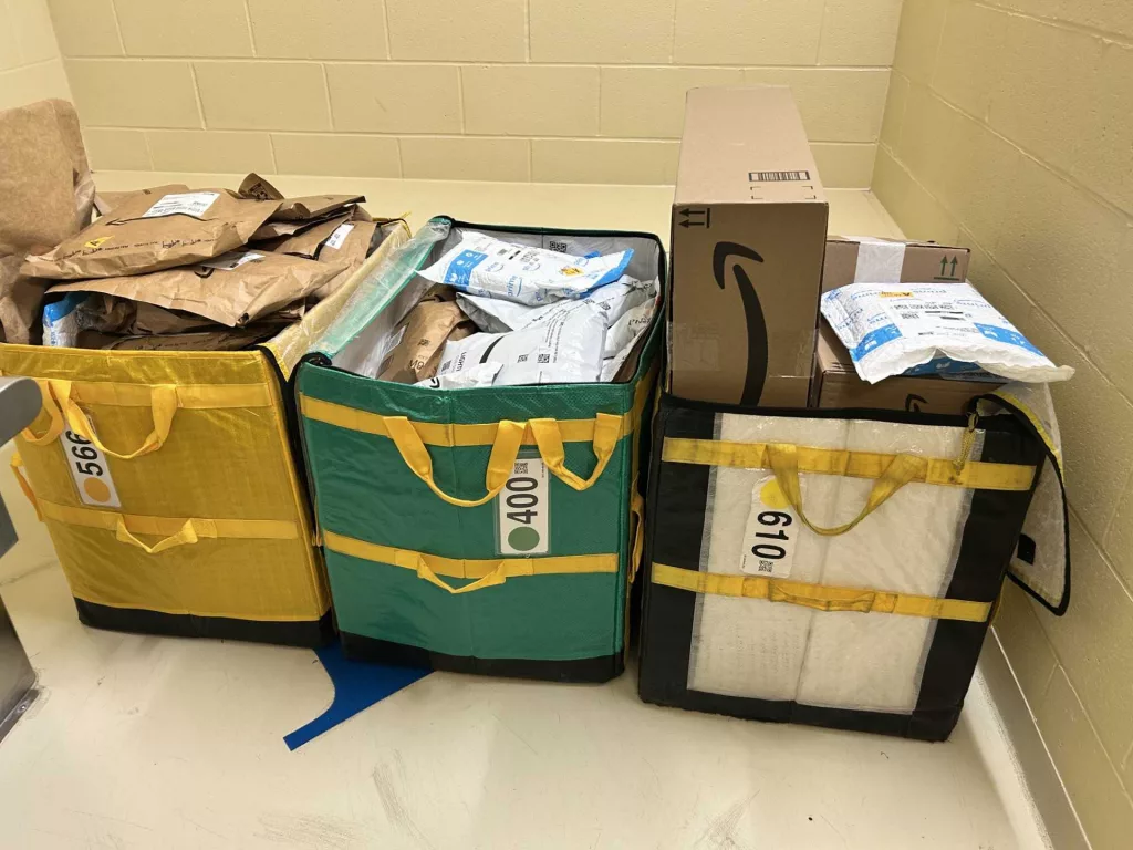 Police discover 80 unattended Amazon packages in Massachusetts woods
